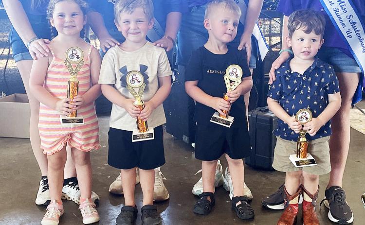 2- & 3-year-olds – (front,  from left) Martha Claire  Bubela, first place; Carter  Oncken, second place;  Stetson Preuss, third  place; and Charlie Hessel,  fourth place. Sticker Photo By Darrell Vyvjala