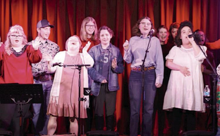 And Then A New Day members participated in a song-writing workshop which concluded with a performance at the Bugle Boy. Shown are (front row, from left) Will Kuhn, Preslie Foster, Brooke Shimek, Mary Wellborn, Caitlin Lewis, Eleanor Benbenek, Amy Vaculik, (back row) Ashton Novicke, Emma Kubala, Shelby Purcell, Jessica Shank, Joelle Mihalovich-Williams, Terri Hendrix-musician/songwriter and Ty Janak. Member not shown is Sirkka Higgs.