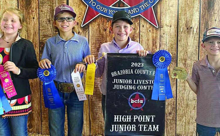 Grand Champion Junior Team – (from left) Hayleigh Pizzitola, Tate Fritsch, Hudson Holub and Joe Carrales. Holub is a member of the Schulenburg 4-H.