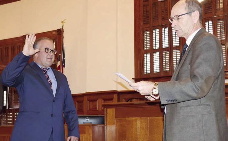 Swearing in for new county atty.