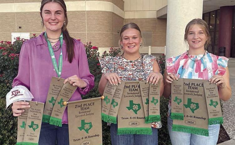 In Invitational Livestock Judging, the team of Madyson Holub, Haley Schramek and Kyrroll Prihoda won reserve champion honors. (This photo, and accompanying information, also appeared in the June 13 issue on Page 1.)
