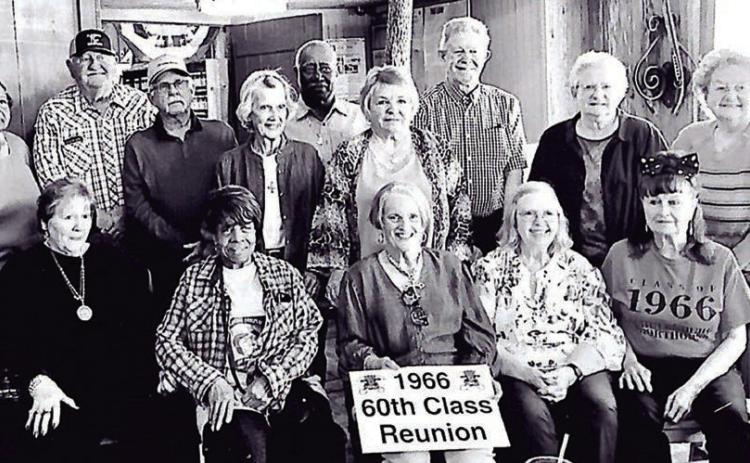 Shown are (front row, from left) Carolyn Niesner Smrkovsky, Carolyn Upton Coleman, Loretta Heinrich Pauler, Gayle Steinmann Kahanek, Carolyn Clark, (middle row) Arline Roitsch Schacherl, Linda Luycx Dieringer, (back row) Betty Harold Williams, Gene Ray Guentert, Marcus Demel, Edward Glass, Alvin Kahanek, Elaine Redding Simper and Charlene Holub Simper.