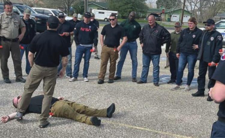 Responders learn how to do a rapid medical evaluation in a potentially hostile environment. They are taught to sweep for major bleeding, apply a tourniquet if needed, clear the airway, and place the victim in the recovery position.