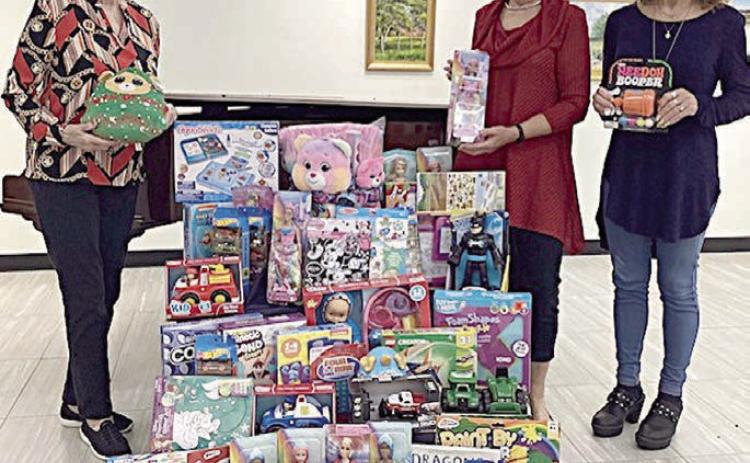 Literary Club collects for Deputy Santa Once again, members of the Schulenburg Literary Club hope to make Christmas a little merrier for some area children. Their collection of toys for the Fayette County Sheriff’s Department’s Deputy Santa program is displayed by members (from left) Betty Herzik, Diana Mikesky and Janice Simons.