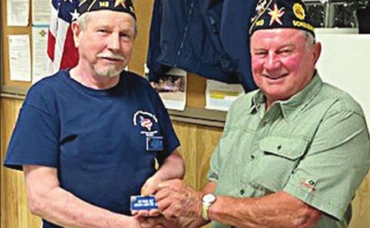 HARRY BARTOSCH (left) was welcomed as the new American Legion Post 143 War Wagon chief by commander Bob Heinrich (left) at the Oct. 5 meeting