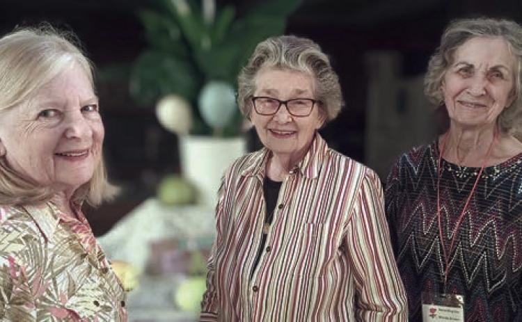 Hostesses were (from left) Janet Murphy, Ruth Fabian and Wanda Brown.