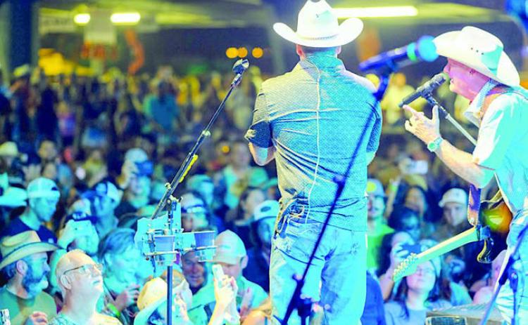 Fans fill the Wolters Park Pavilion for Saturday night’s performance by Dos Borrachos. Photo By Andy Behlen / Courtesy of Fayette County Record