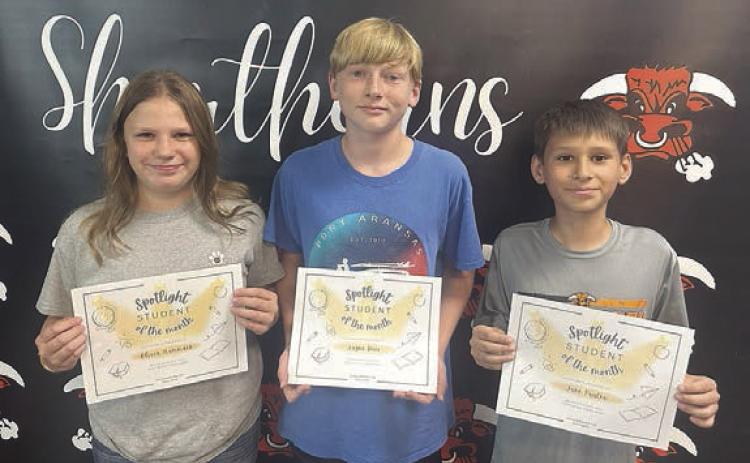 Junior High Spotlight Students – (from left) Olivia Hammack, Lane Dees and Jake Pauler.