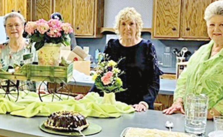 Hostesses for the Garden Club meeting were (from left) Janet Kobza, Barbara Vinson and Patricia Greeson.