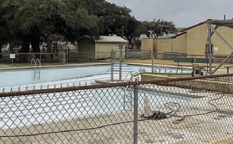 The City-owned pool in Wolters Park remains empty as it failed to meet certain codes and, therefore, will not be open this year. Sticker Photo By Darrell Vyvjala