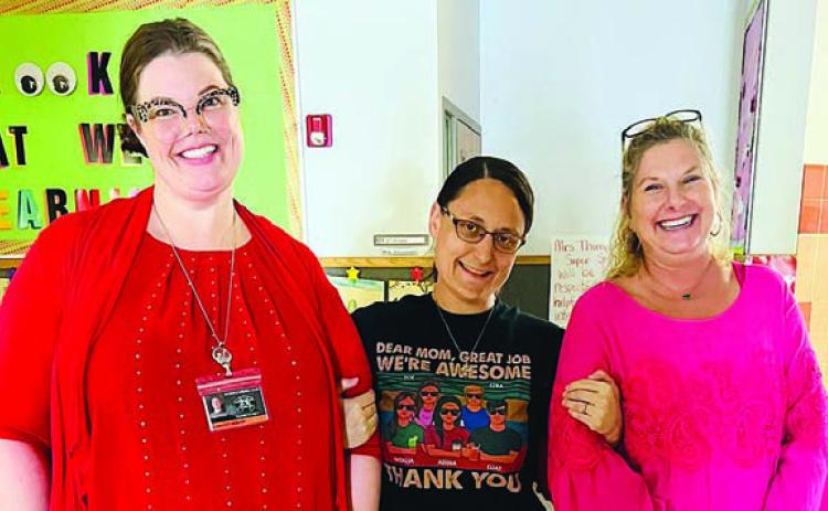 (from left)  Kirsten Holub, Adina Barnett and Sandy  Machicek