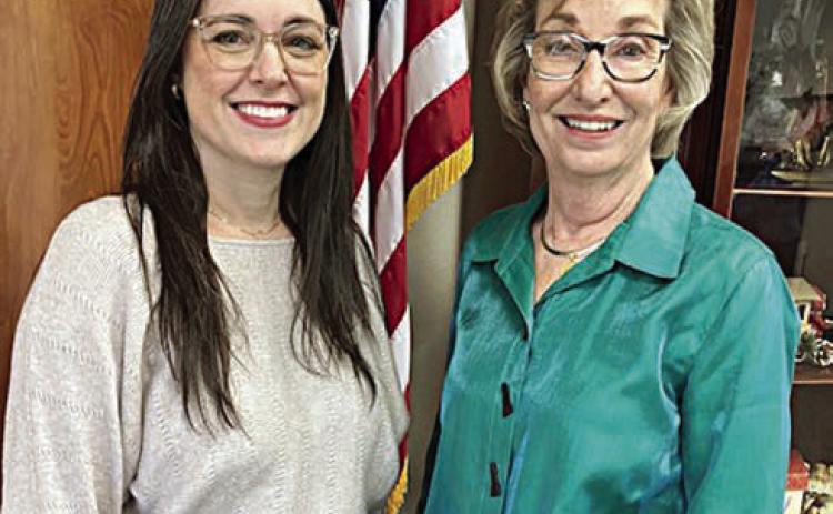 Guest speaker Holly Czimskey (left) is shown with club president Diana Mikesky (right).
