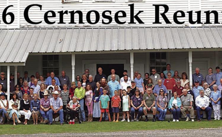 The Cernosek family poses in front of the Ammannsville KJT Hall. (PAID)