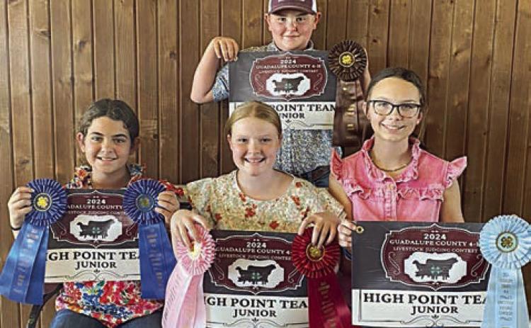 Champion Junior Team – (front row, from left) Adalyn Carrales, Kaisley Janecka, Tatum Fritsch and (back) Abraham McBride. Abraham McBride is a member of the Schulenburg 4-H.