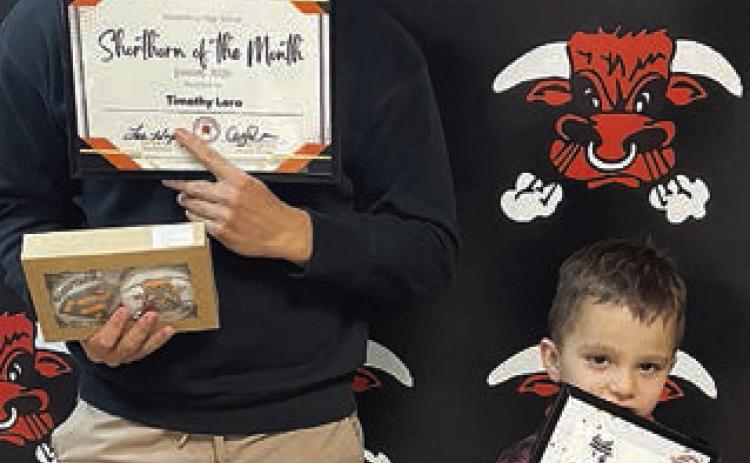 Students of the month Announced as students of the month at Schulenburg ISD at the Board of Trustees meeting Monday night were: Timothy Lara (left), high school; Roan Berry (right), elementary; and (not shown) Derrick Adeogun, junior high. Sticker Photo By Darrell Vyvjala