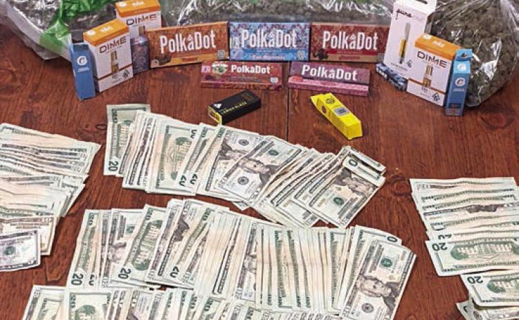 Drugs, cash found after traffic stop