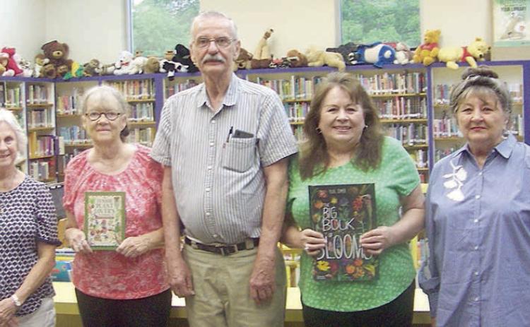 Garden Club donates books to library