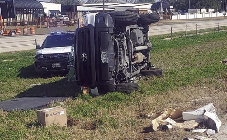 After tire deflation devices were deployed, the vehicle being pursued by law enforcement traveled a short distance and crashed, coming to a stop in the median.