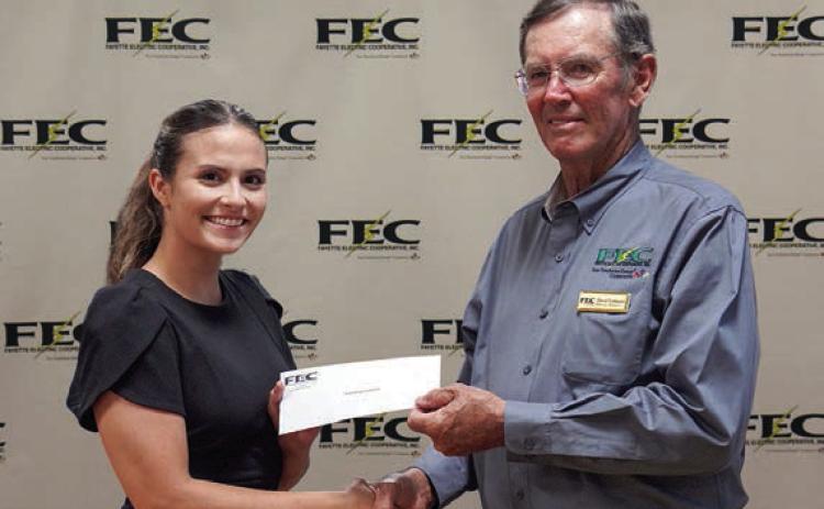 Turtle Wing Foundation received a $7,500 grant from FEC and CoBank. Shown are (from left) Turtle Wing Foundation executive director Destiny Psencik and FEC board president David Lehmann.