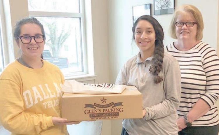 PRESENTATION AT ROUND TOP-CARMINE ISD – (from left) Rylee Handy, Ilse Salinas and Mrs. Kathy Warburton.