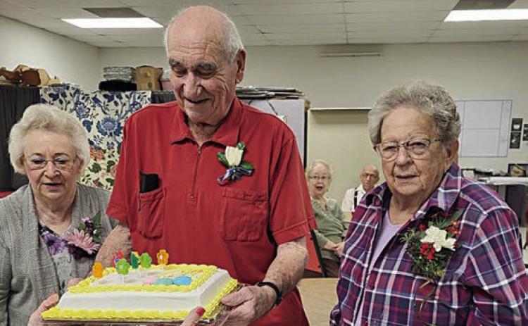Birthday honorees for October included (from left) Helen Ohnheiser, Allen Hoelscher and Irene Janda.