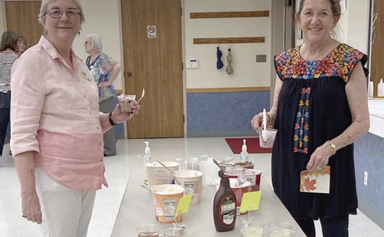 Enjoying the ice cream social at the Fayette County Retired Teachers’ Association meeting are Kim Joost and Rebecca Halder.