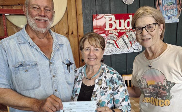 A donation to Colorado County Senior Connections was made by Hermann Sons Life Lodge 14 at the meeting on Aug. 14. Shown are (from left) Ed Moeller, Lodge 14 president; Marilyn Hinze of Colorado County Senior Connections; and Mary K. Seifert, representing Lodge 14. Colorado County Senior Connections is a new group for anyone age 55 and up that meets on the first and third Wednesday in Columbus.