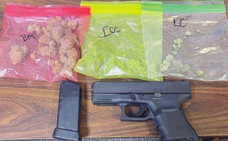 SPD officers confiscated the drugs and a firearm shown above from a vehicle that ran through a barricade last week.