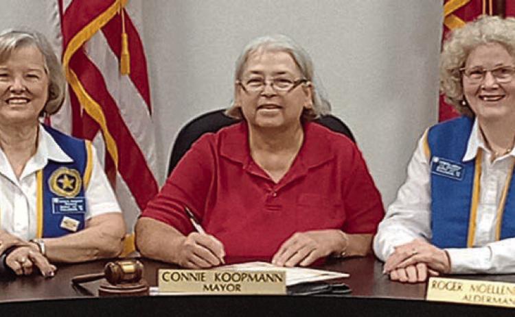 A proclamation signed by Mayor Connie Koopmann (center) designates Friday, May 22 as “Poppy Day” in Schulenburg. On hand for the signing were Patricia Hranicky (left), Legion Auxiliary Unit 143 president, and Barbara Brown (right), Legion Auxiliary Unit 143 vice president.
