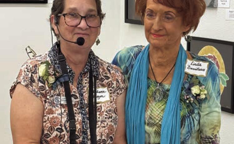 THE first place People ’s Choice Awa rd at the Ageless Artistry show went to Linda Barrilleaux (right) for her piece Spanish Dagger. Senior Connections program director Stephanie Shroyer (left) presented the award.
