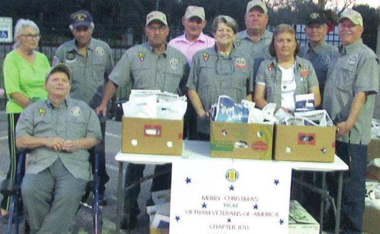 When Santa and Mrs. Claus visited Schulenburg on Dec. 4, Vietnam Veterans of America Chapter 870 and Associates filled goodie bags for the youngsters. Shown are (standing, from left) Jo Ann Brown, Ray Urban, Louis Estradatreasurer, Leonard Korenek, Kathy Kutac-associate, board member Daniel Kutac, Billie Urban-associate, Eugene Krupala, Andy Janda-president and (front) Terry Brown. The Vietnam Veterans of America Chapter 870 and Associates wish everyone a Merry Christmas and Happy New Year!
