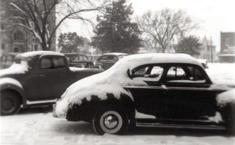 La Grange snow scene showing cars covered in snow on West Colorado Street in 1949. Heavy snow started falling late Saturday evening, Jan. 29 and continued until 3 p.m. on Sunday, Jan. 30 to a depth of six inches. The temperature fell to 2 degrees. Photo Courtesy of Fayette Heritage Museum &amp; Archives