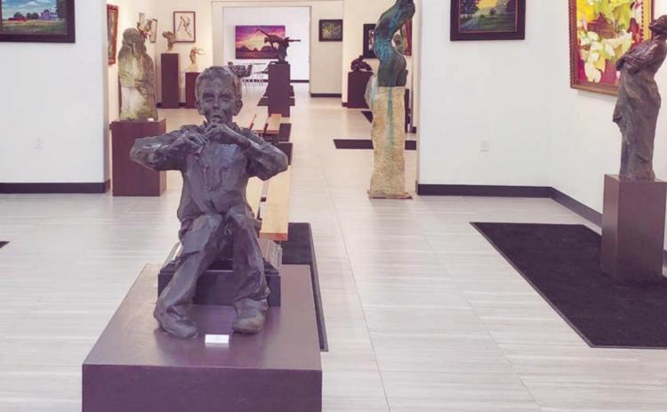Sculptures and paintings on display at the Schulenburg campus of Arts for Rural Texas