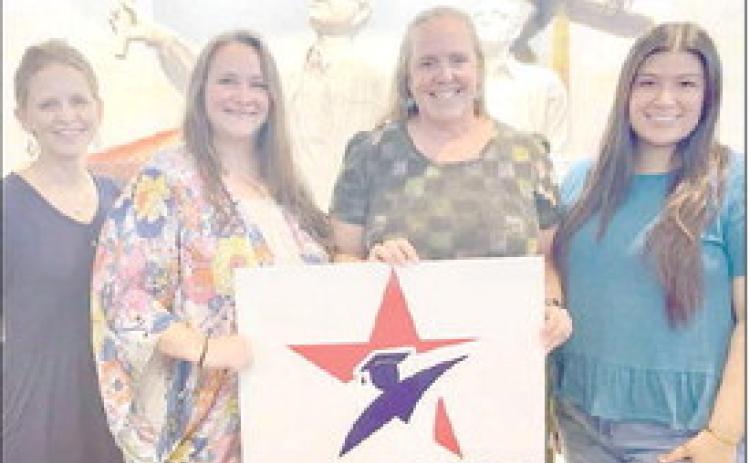 $30,000 gra nt pr esented – On hand as the Stanzel Family Foundation Inc. gave a $30,000 grant to the ACCSS program were (from left) Cheryl Hudec Pekar, Stanzel Family Foundation executive director; Sarah Lachelle Nickel, ACCSS student success coach; Susie Shank, ACCSS director; and Melanie Ramirez, Stanzel Family Foundation program director.