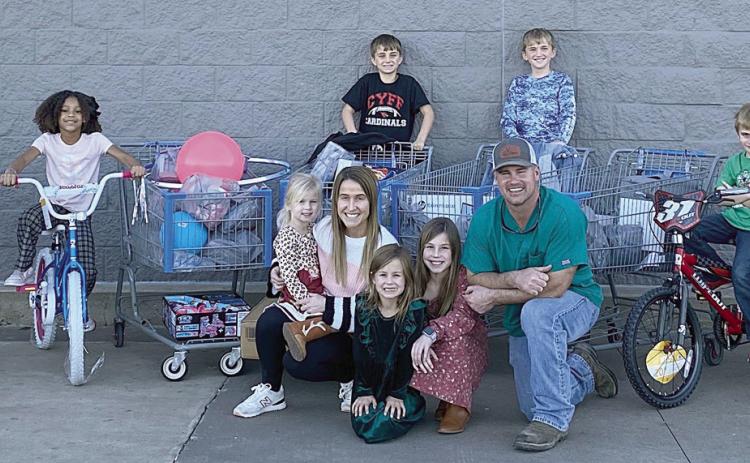 Kainers provide Christmas shopping trip for six Boys & Girls Club members