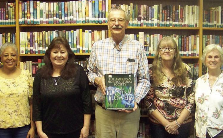 Garden Club donates book to local library