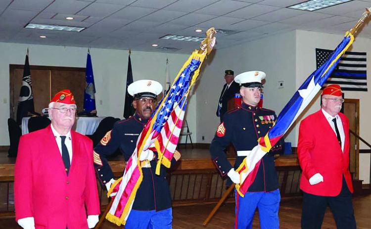 Posting and retrieving colors are (from left) Richard Chance, Willie Matthews of Schulenburg, Montana Olle of Schulenburg, and David Wyman. Photo By Melanie Berger / Courtesy of Flatonia Argus