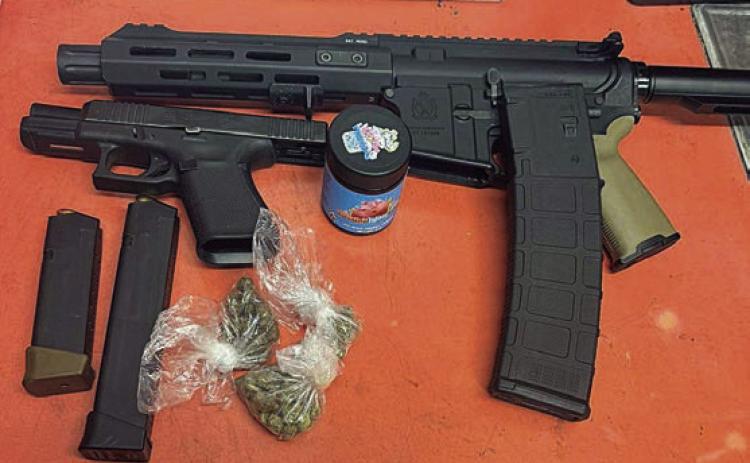 Shown above are the drugs and weapons found by SPD officers following a traffic stop on I-10 this past Saturday.