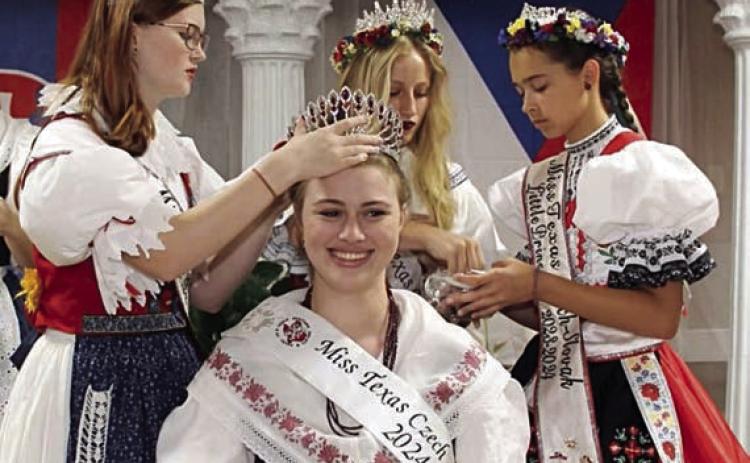 Madelyn Karstedt (front) was crowned the 2024-25 CHS Miss Texas Czech-Slovak Queen by (back, from left) 2023-24 Miss Texas Czech-Slovak Junior Queen Grace Moravec, Queen Katie Kostelnik and Little Princess Mabry Sustala.
