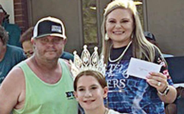 1st Place – “East Texas Smokers” - (back, from left) Scotty and Anna Bryce of Timpson. 2nd Place – “All Sauced Up #1” - Sherry Schneider of La Grange. 3rd Place – “Spice Spice Baby” - Megan Strykar of Goliad. Sticker Photo By Kade Vyvjala