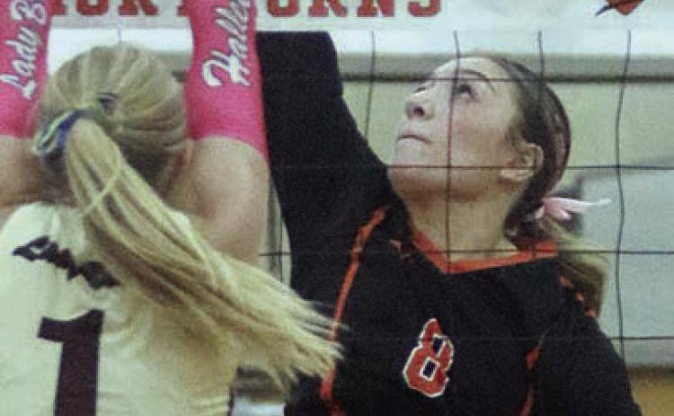 Four-set win in district finale