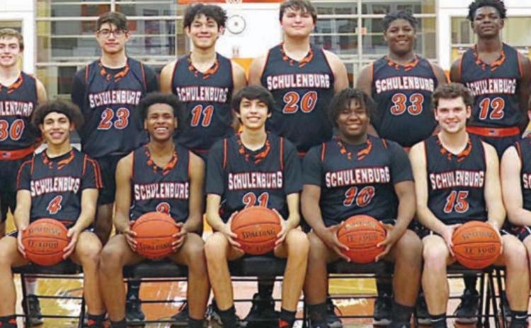 This photo of the 2020-21 Shorthorn basketball team members, coaches, and managers appeared atop the front page of the March 18 issue after they reached the Class 2A state semifinals.