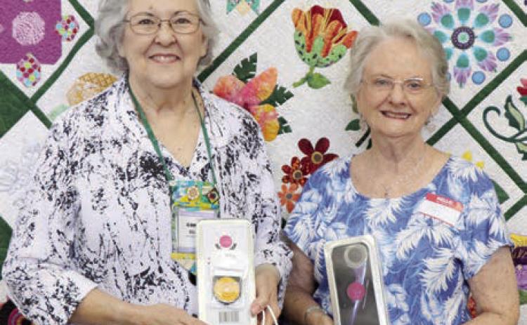 The Colorado Valley Quilt Guild’s “Cut Above” award went to Jo Anne Hill (left) and Pat Scherer (right).
