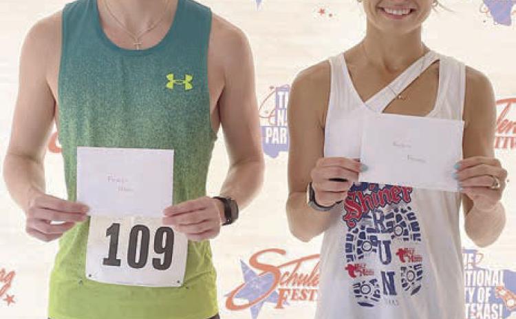 Overall 5K winners – (from left) Nathan Sandelovic, fastest male with a time of 18:47.833; and MacKinly Kifer, fastest female with a time of 19:47.884. Sticker Photo By Darrell Vyvjala