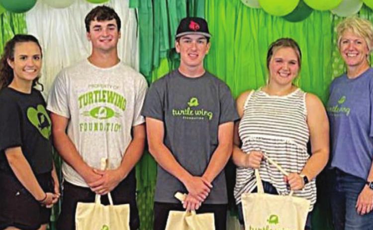 Turtle Wing gives scholarships to four students