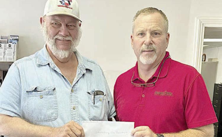 A donation was made by Hermann Sons Life Lodge 14 to the Schulenburg Volunteer Fire Department in observance of Make A Difference Day in October, with the motion approved at the meeting on Aug. 9. President Ed Moeller (left) represented Lodge 14 in presenting a check for $500 to Jeff Proske (right), Schulenburg Volunteer Fire Department chief.