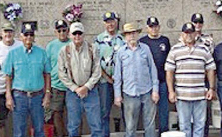 American Legion Post 143 places 1,250+ flags on veterans’ graves