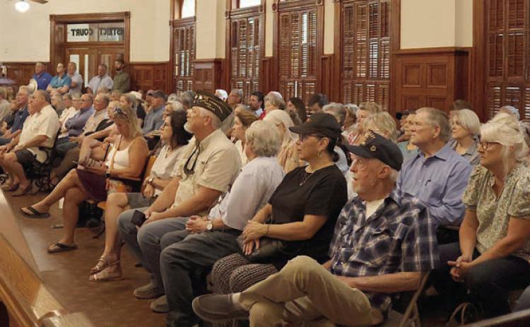 A standing-room-only crowd filled the District Courtroom for the Fayette County Commissioners Court meeting last Thursday. Photo By Melanie Berger / Courtesy of Flatonia Argus