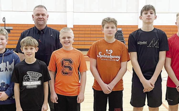BOYS’ DIVISION WINNERS – (front, from left) Brody Brossmann, 9-year-old; Tripp Brown, 10-yearold; Seth Seydler, 11-year-old; William Herzik, 12-year-old; William Eudy, 13-year-old; and Weston Hollas, 14-year-old. Also pictured is Council 2902 Grand Knight Paul Zapalac (back).