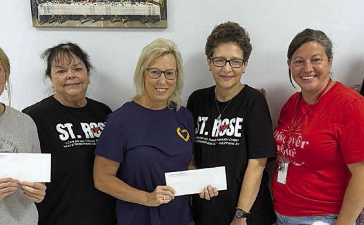 St. Rose Catholic School Teacher Grant – (from left) Madalynn Schneider, Doris Bujnoch, Shelly Langhamer, Pamela Vrazel and Lindsay Schiffli, with Melanie Ramirez, Stanzel Family Foundation program director.